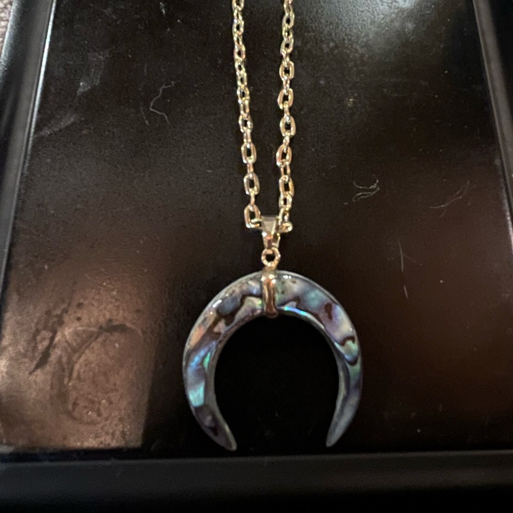 Moon charm with gold tone chain
